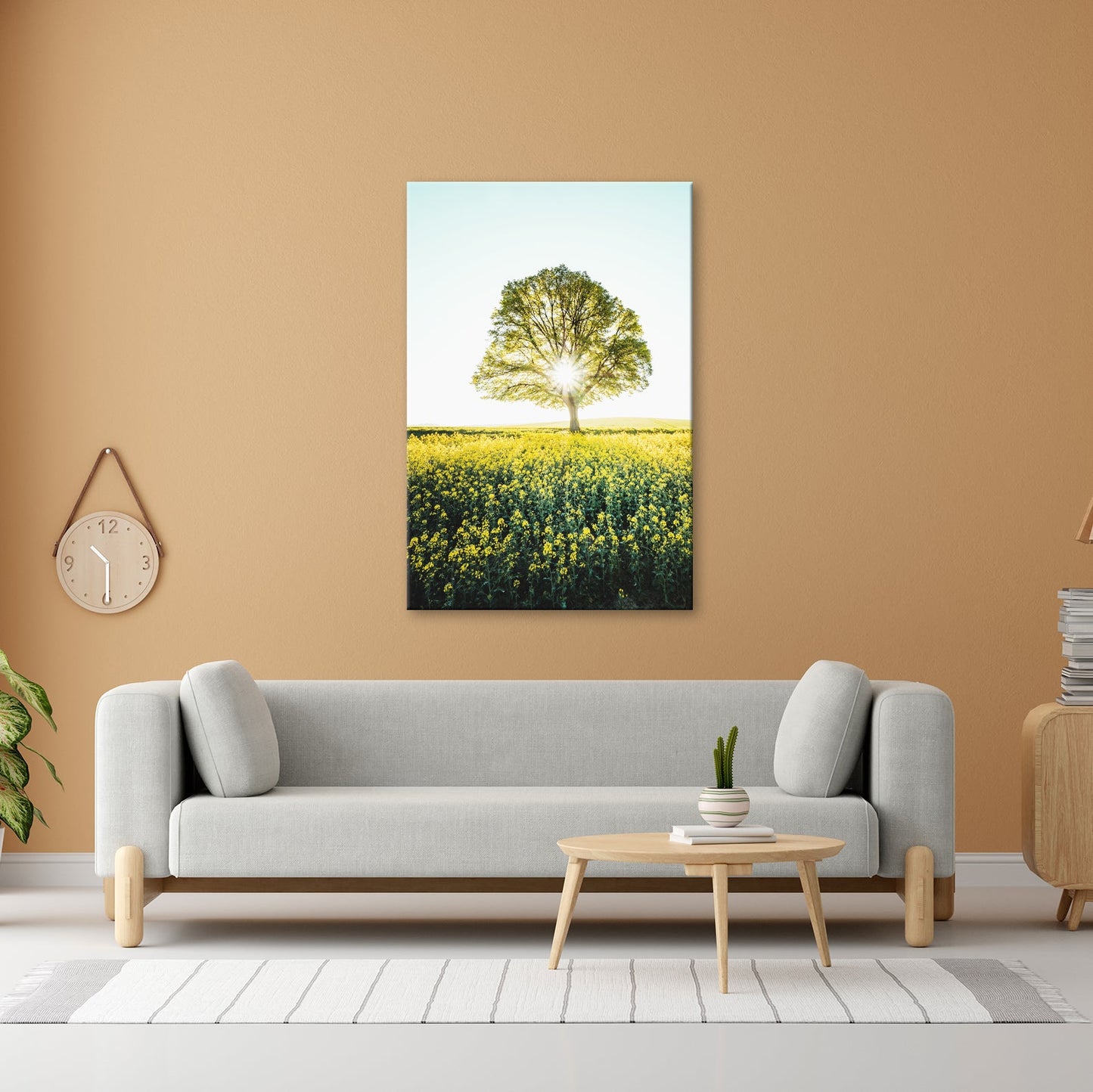 Leinwandbild Goldene Sonne küsst den Baum im Meer aus Blüten. - deyoli