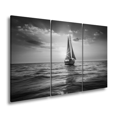 Leinwandbild Goldene Wellen tragen das Boot ins Licht des Abends. - deyoli
