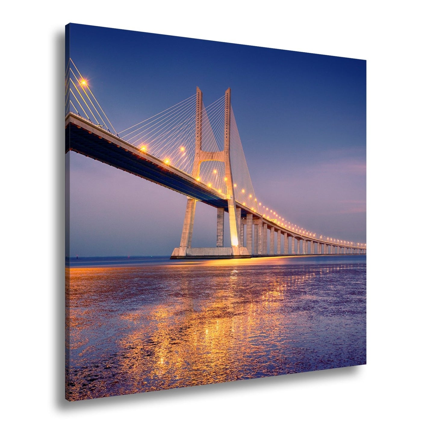 Leinwandbild Goldenes Leuchten über Brücke bei ruhigem Abendmeer XXL – Landschaft - deyoli