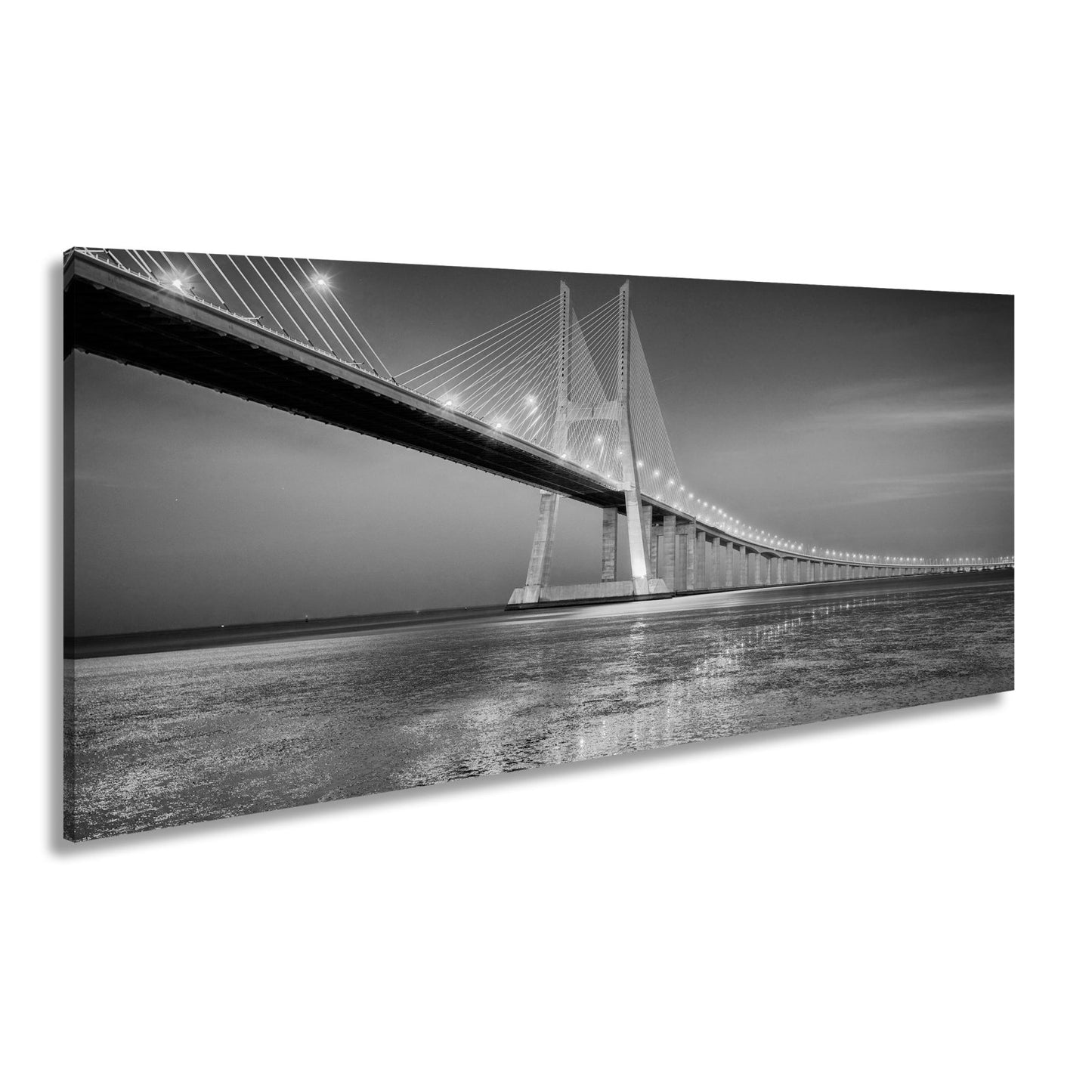 Leinwandbild Goldenes Leuchten über Brücke bei ruhigem Abendmeer XXL – Landschaft - deyoli