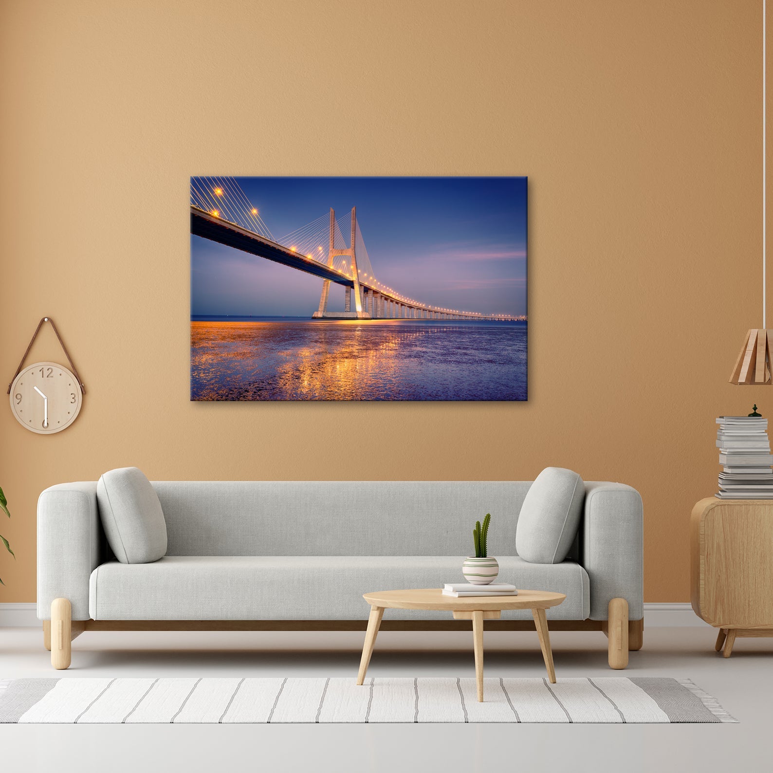 Leinwandbild Goldenes Leuchten über Brücke bei ruhigem Abendmeer XXL – Landschaft - deyoli
