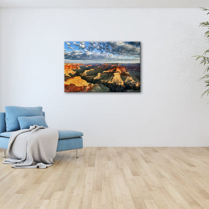 Leinwandbild Grand Canyon XXL – Sonnenlicht malt goldene Schatten in die Weiten - deyoli