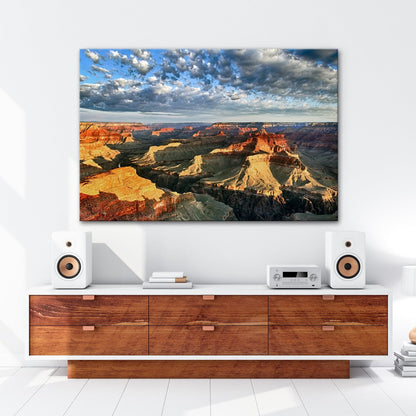 Leinwandbild Grand Canyon XXL – Sonnenlicht malt goldene Schatten in die Weiten - deyoli