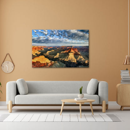 Leinwandbild Grand Canyon XXL – Sonnenlicht malt goldene Schatten in die Weiten - deyoli
