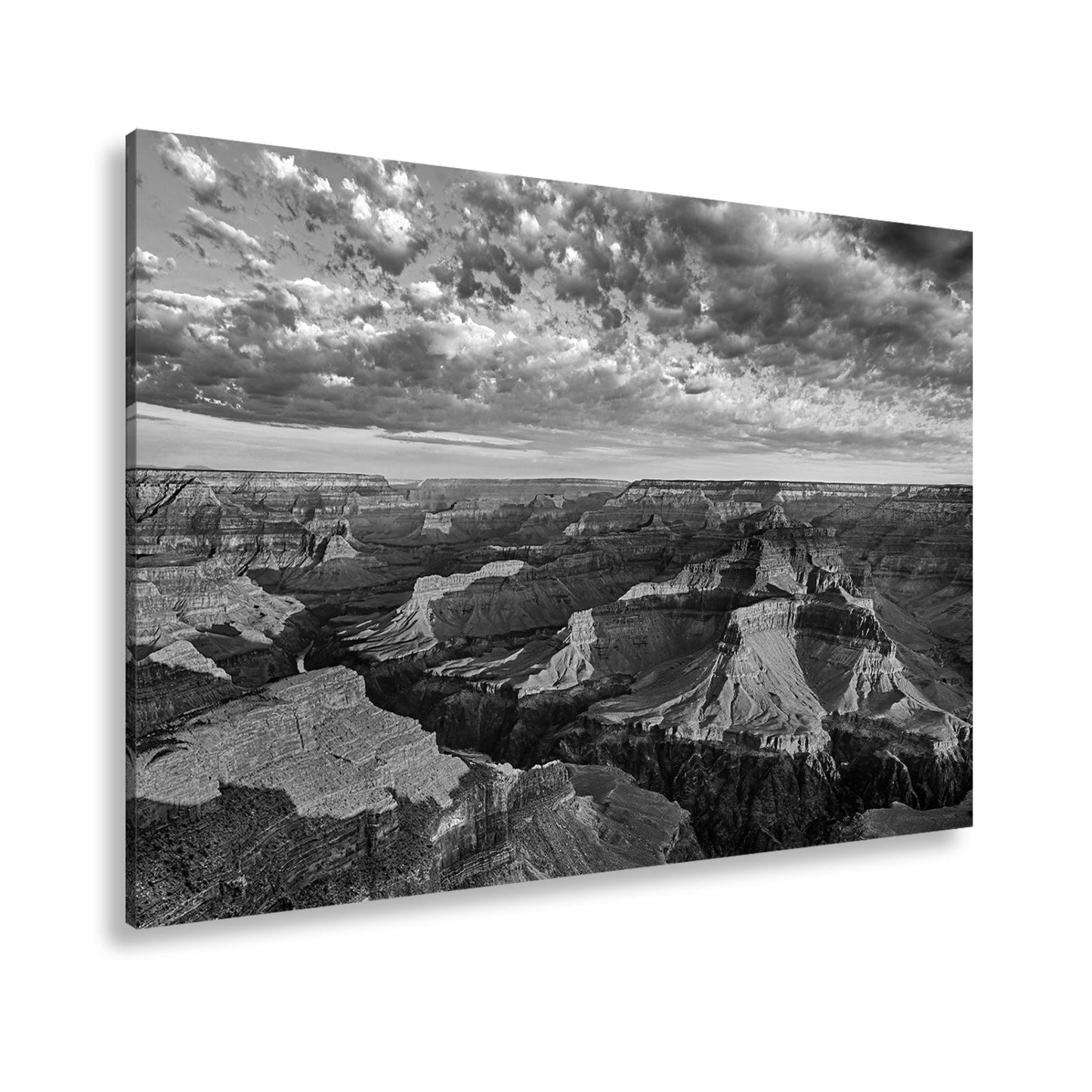 Leinwandbild Grand Canyon XXL – Sonnenlicht malt goldene Schatten in die Weiten - deyoli