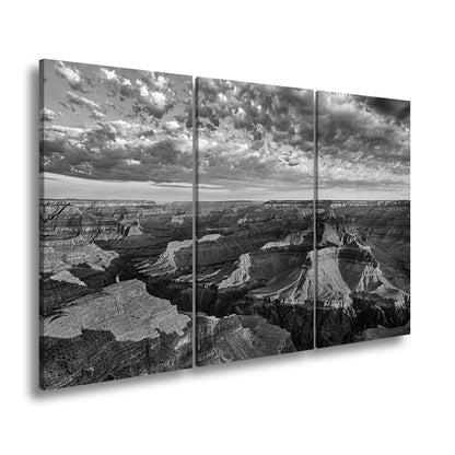 Leinwandbild Grand Canyon XXL – Sonnenlicht malt goldene Schatten in die Weiten - deyoli