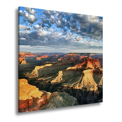 Leinwandbild Grand Canyon XXL – Sonnenlicht malt goldene Schatten in die Weiten - deyoli