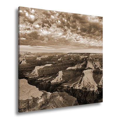 Leinwandbild Grand Canyon XXL – Sonnenlicht malt goldene Schatten in die Weiten - deyoli