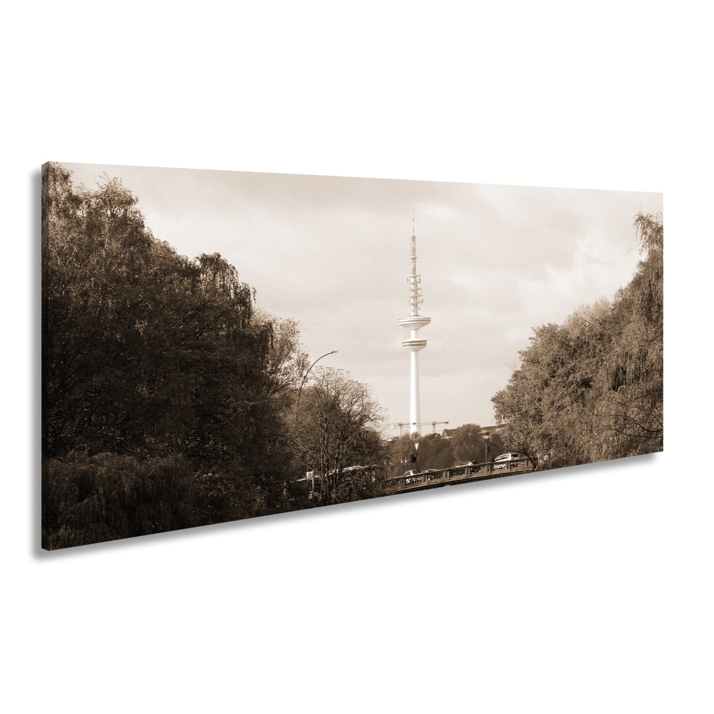 Leinwandbild Hamburg XXL – Goldene Alsterbrücke unter herbstlichen Bäumen mit Funkturm - deyoli
