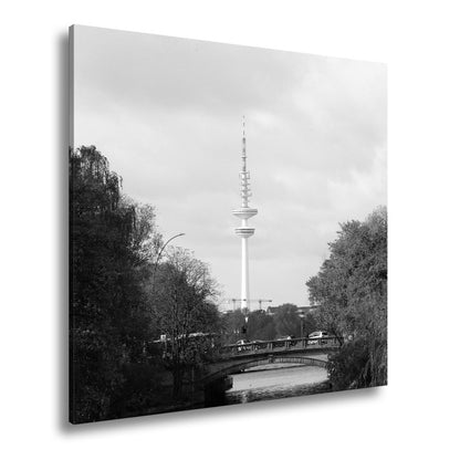 Leinwandbild Hamburg XXL – Goldene Alsterbrücke unter herbstlichen Bäumen mit Funkturm - deyoli