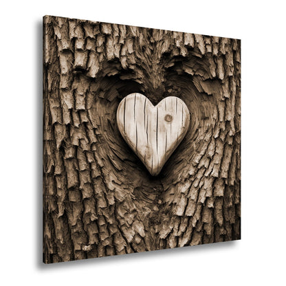 Leinwandbild Handwerk der Natur – geschnitzte Liebe im Baumherz. - deyoli