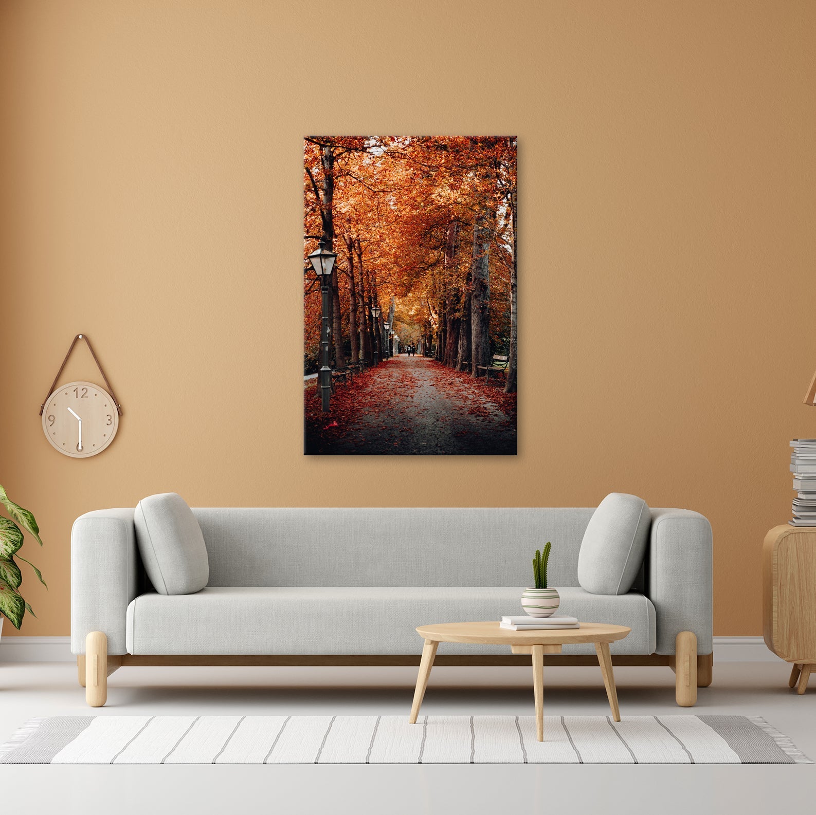 Leinwandbild Herbstfarben tanzen über einen romantischen Laubweg. - deyoli