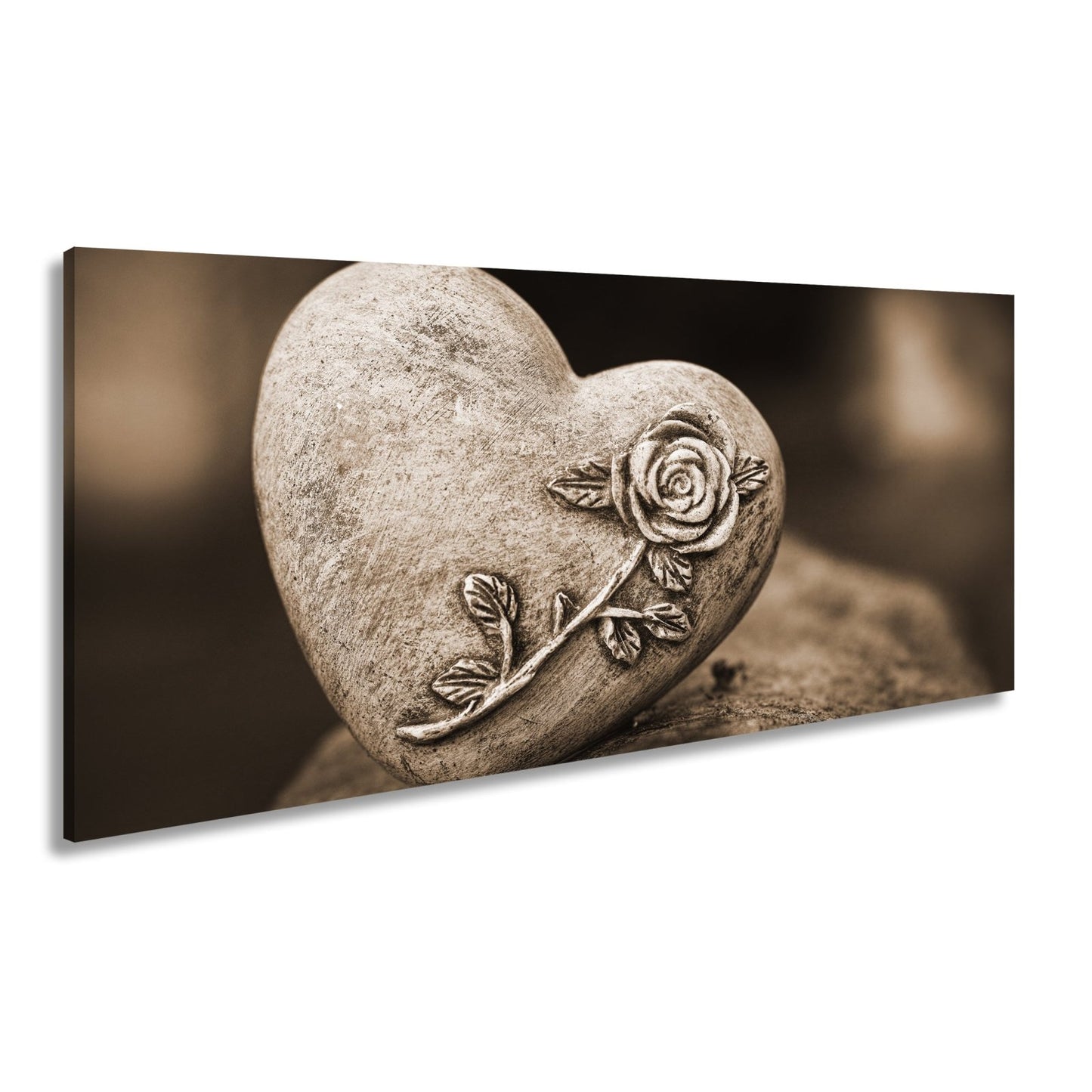Leinwandbild Herz aus Stein – verziert mit einer Rose der Erinnerung. - deyoli