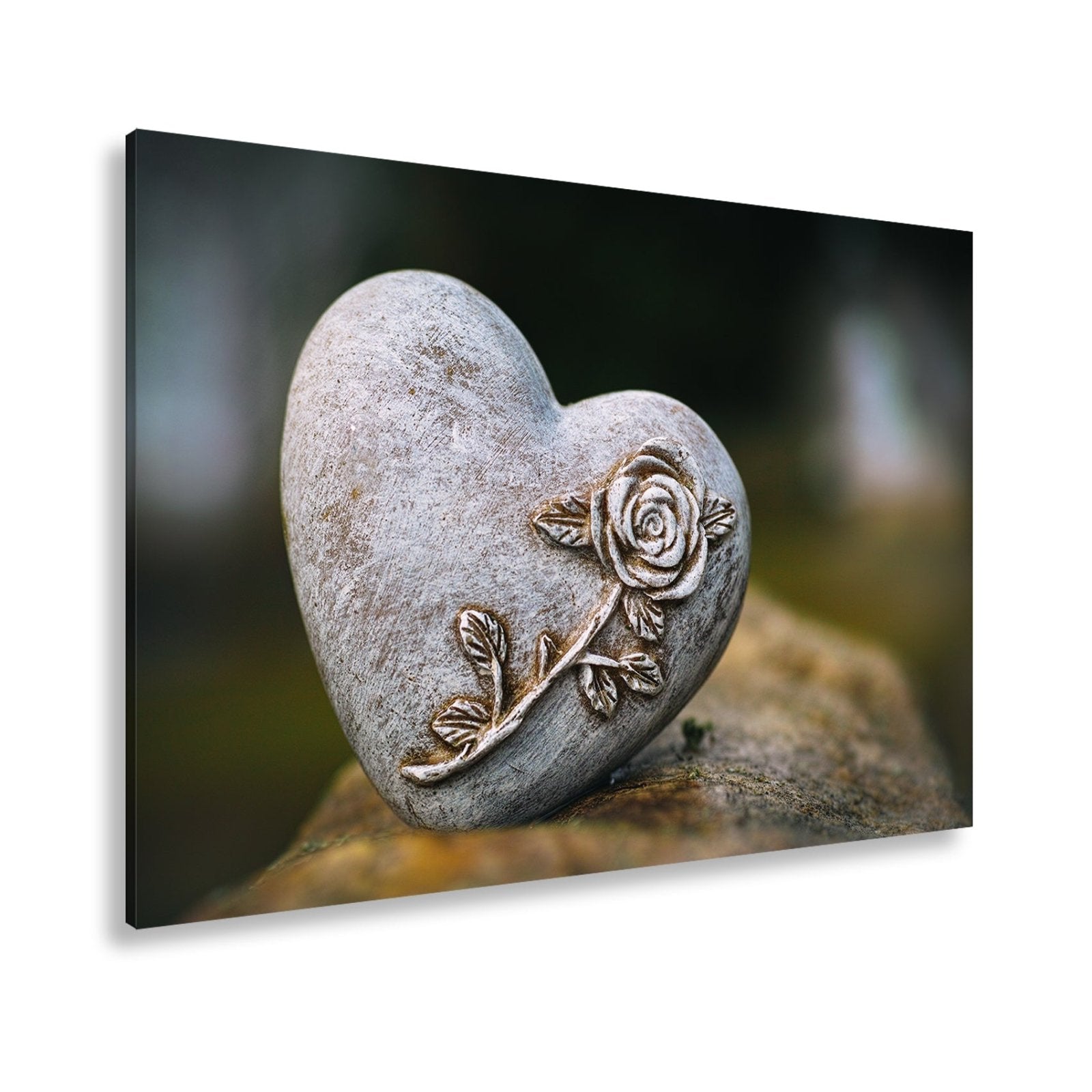 Leinwandbild Herz aus Stein – verziert mit einer Rose der Erinnerung. - deyoli