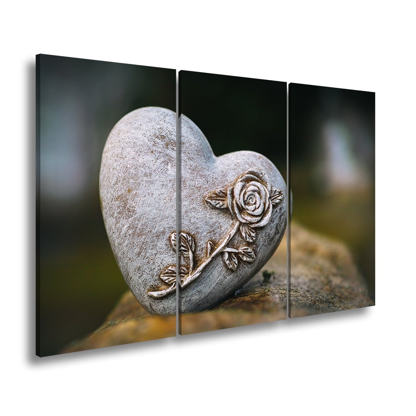 Leinwandbild Herz aus Stein – verziert mit einer Rose der Erinnerung. - deyoli
