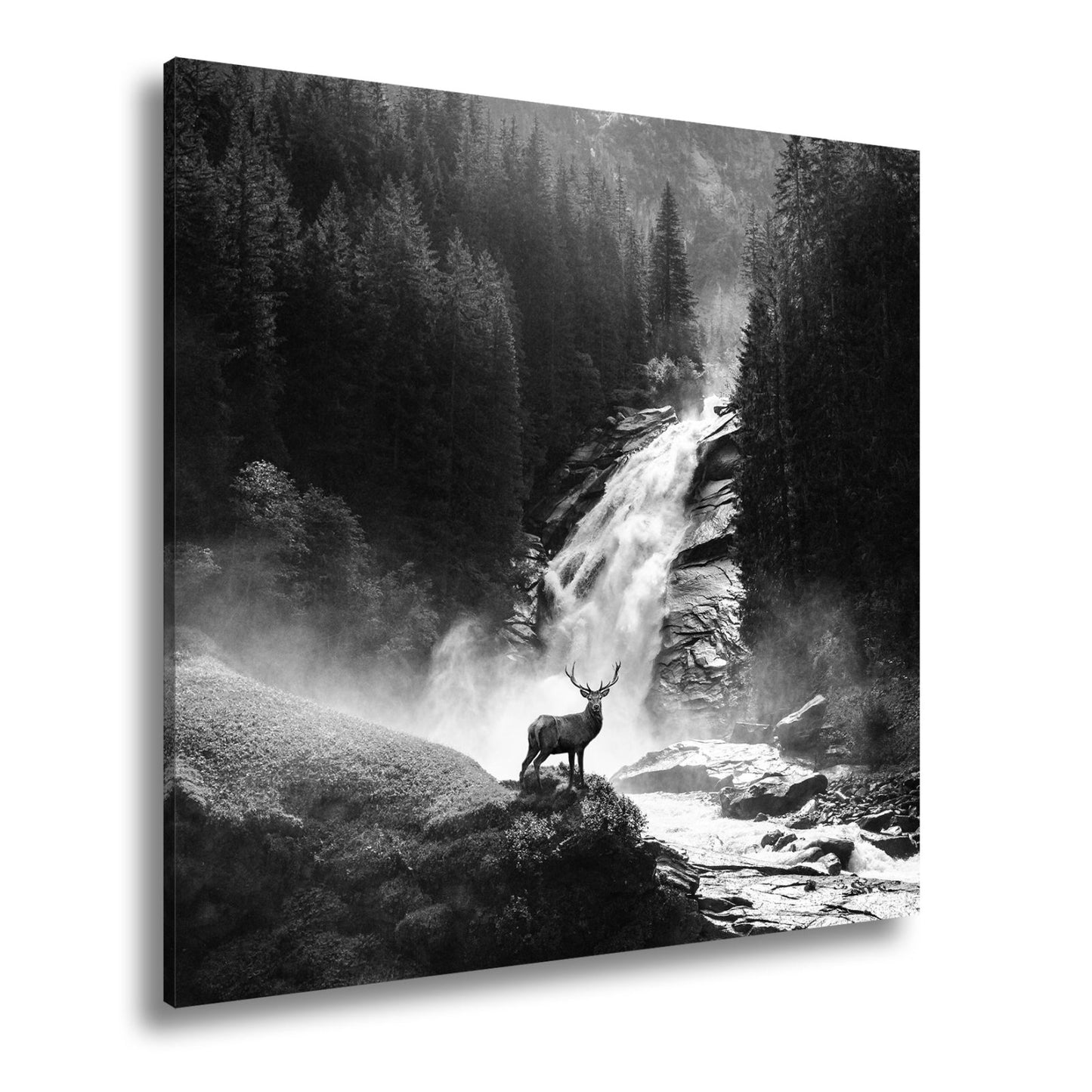 Leinwandbild Hirsch vor tosender Wasserfallkulisse - deyoli