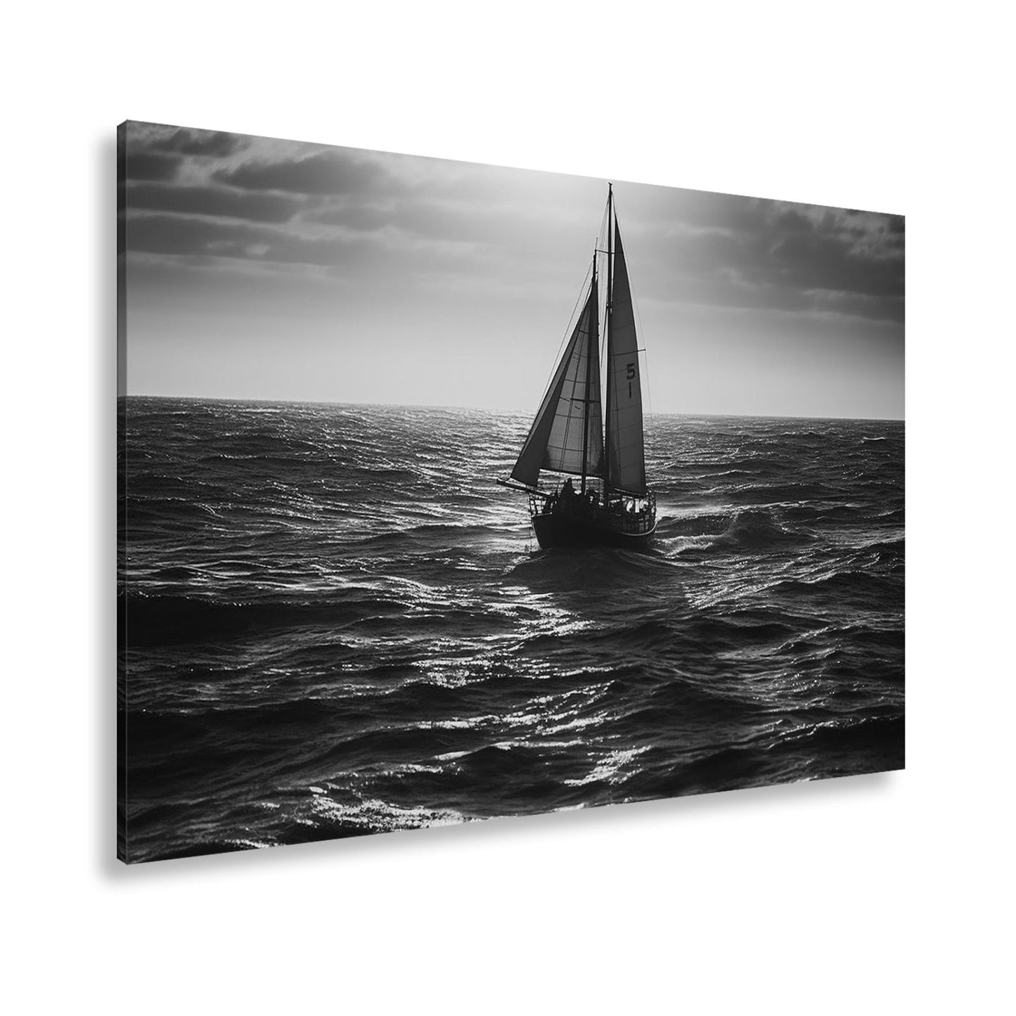 Leinwandbild Im Glanz der See trotzt das Segelboot der Weite. - deyoli