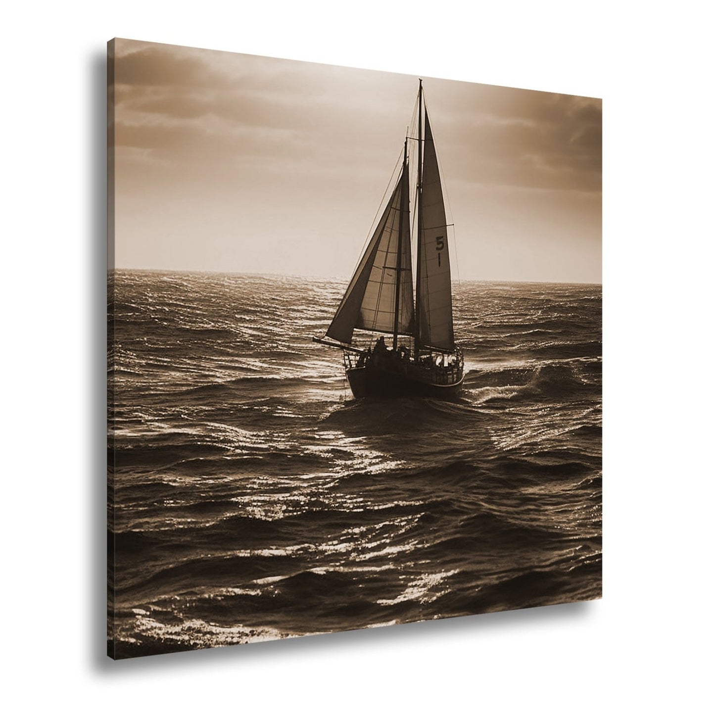 Leinwandbild Im Glanz der See trotzt das Segelboot der Weite. - deyoli
