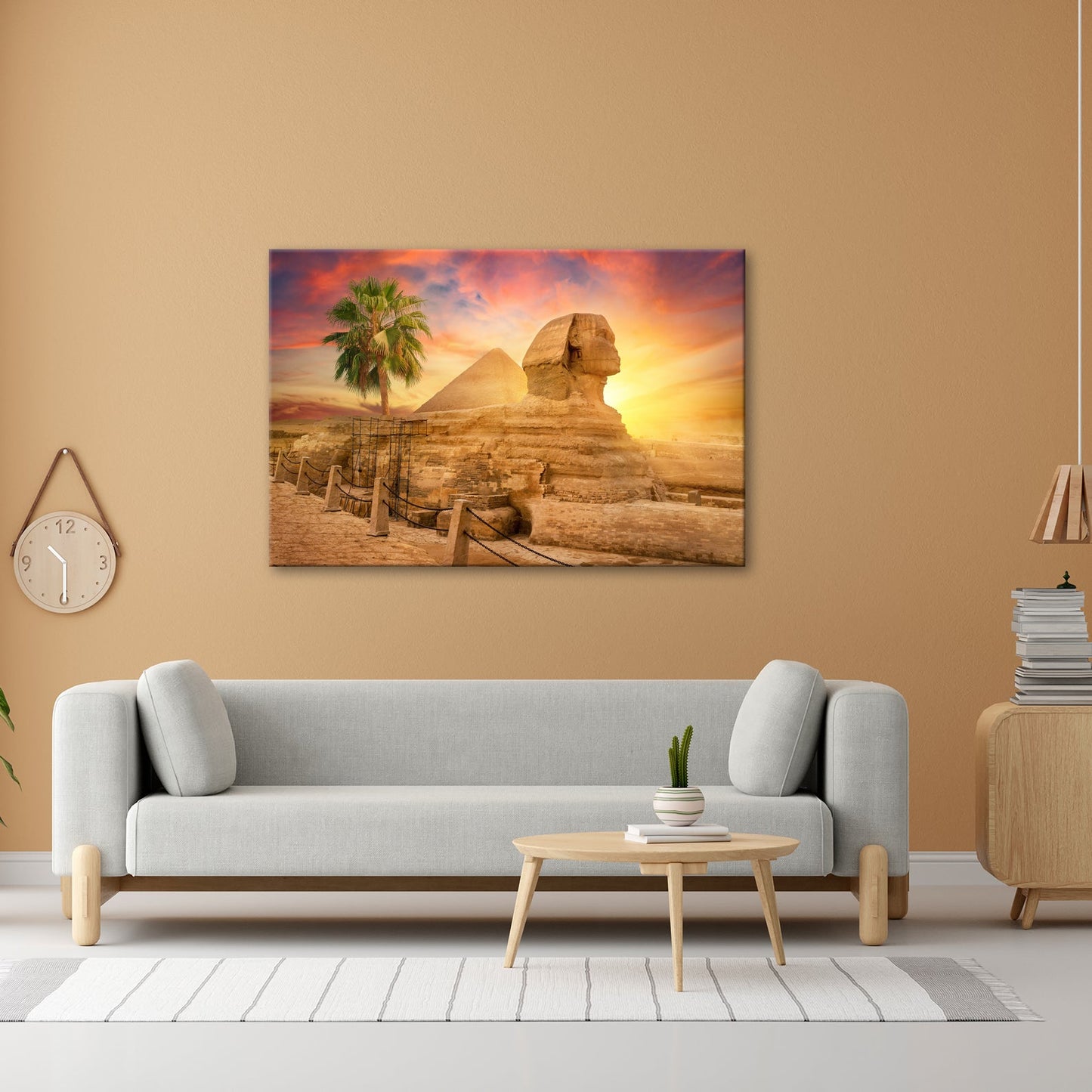 Leinwandbild Im Glanz der Sonne – die Sphinx ruht vor ägyptischer Pracht. - deyoli