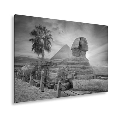 Leinwandbild Im Glanz der Sonne – die Sphinx ruht vor ägyptischer Pracht. - deyoli