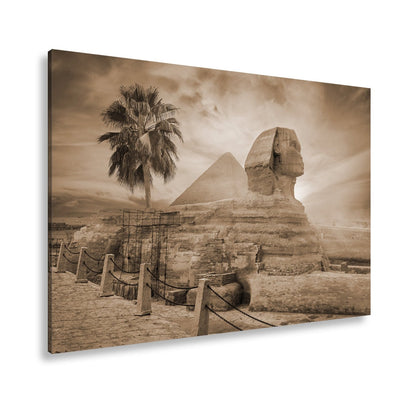 Leinwandbild Im Glanz der Sonne – die Sphinx ruht vor ägyptischer Pracht. - deyoli