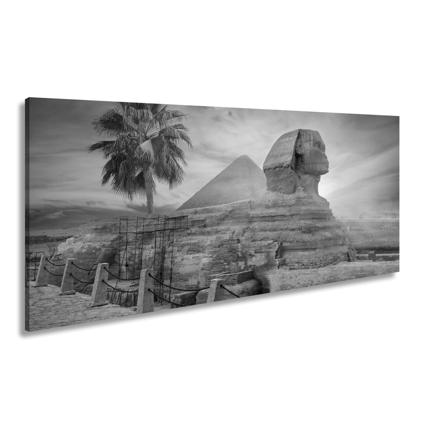 Leinwandbild Im Glanz der Sonne – die Sphinx ruht vor ägyptischer Pracht. - deyoli