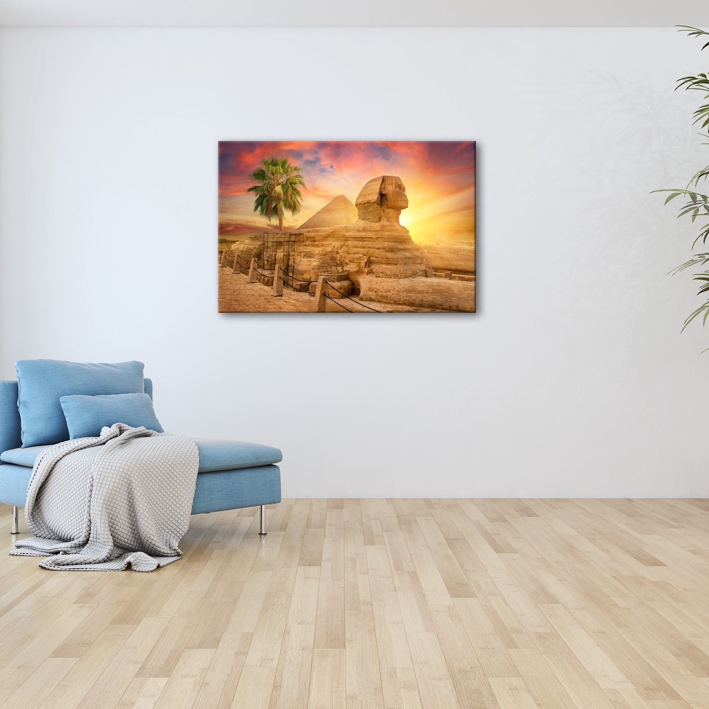 Leinwandbild Im Glanz der Sonne – die Sphinx ruht vor ägyptischer Pracht. - deyoli