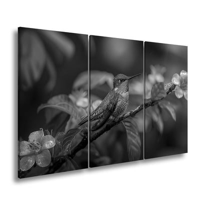 Leinwandbild Inmitten von Blüten wacht ein Juwel auf seinem Zweig. - deyoli