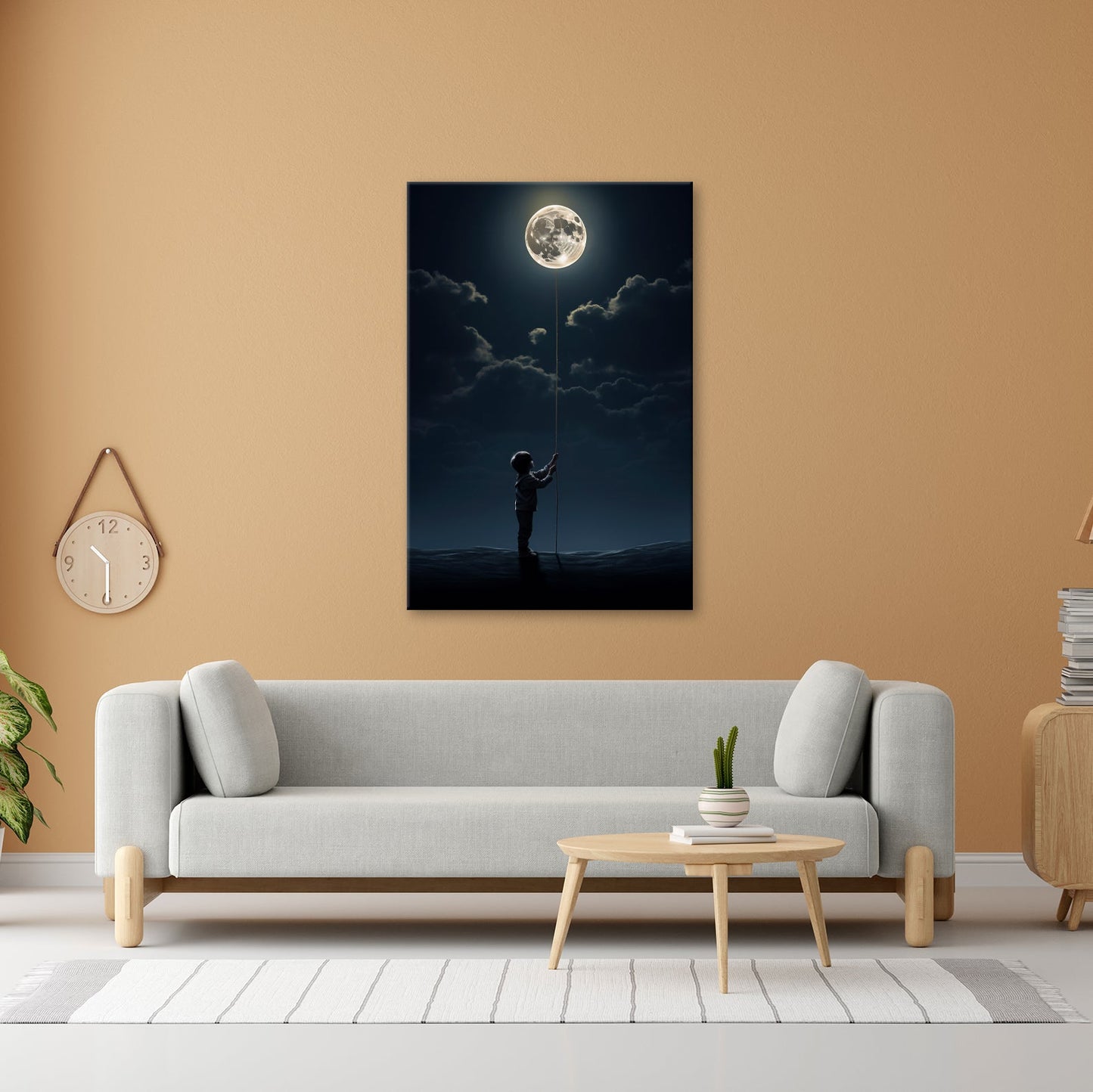 Leinwandbild Kind hält den Mond wie einen Traum an einer Schnur - deyoli