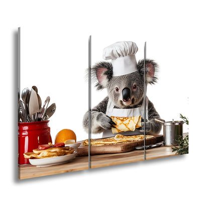 Leinwandbild Koala - Koch zaubert Pfannkuchen mit Liebe und Präzision. - deyoli