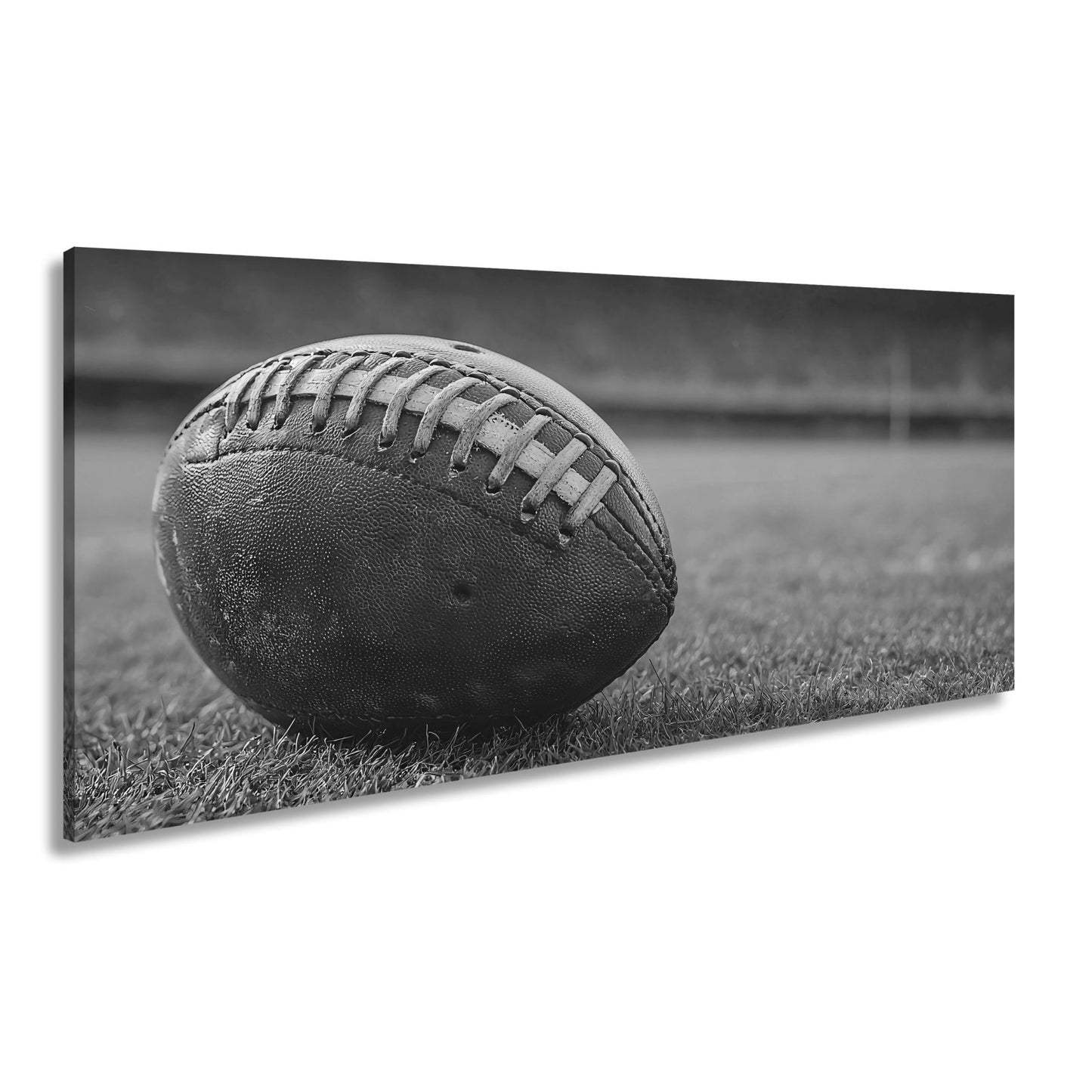 Leinwandbild Leder, Rasen, Spannung – Football in Nahaufnahme. - deyoli