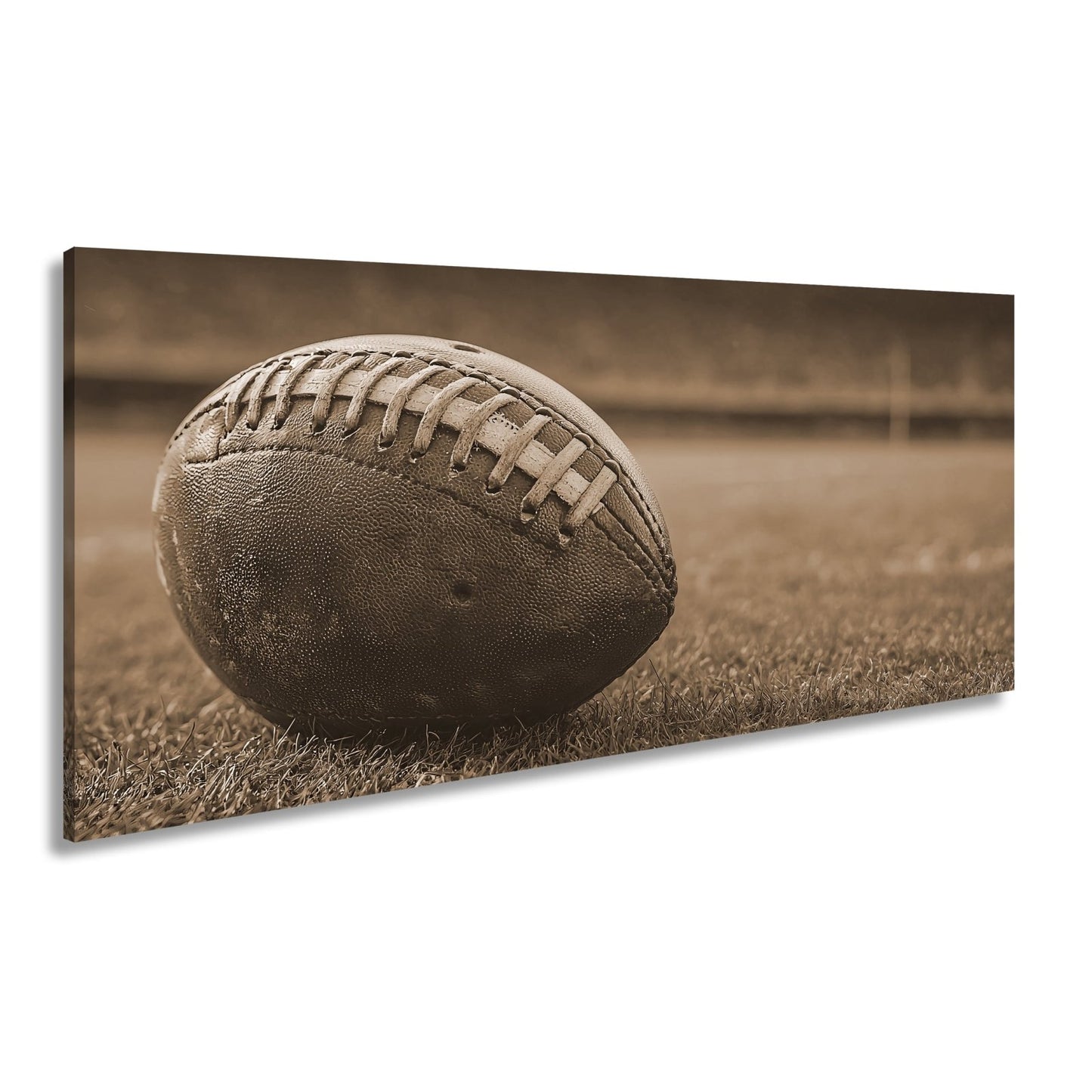 Leinwandbild Leder, Rasen, Spannung – Football in Nahaufnahme. - deyoli