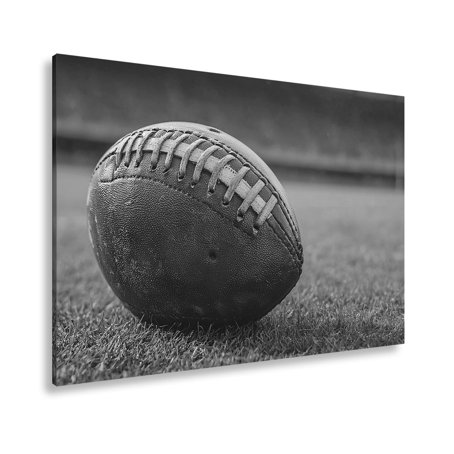 Leinwandbild Leder, Rasen, Spannung – Football in Nahaufnahme. - deyoli