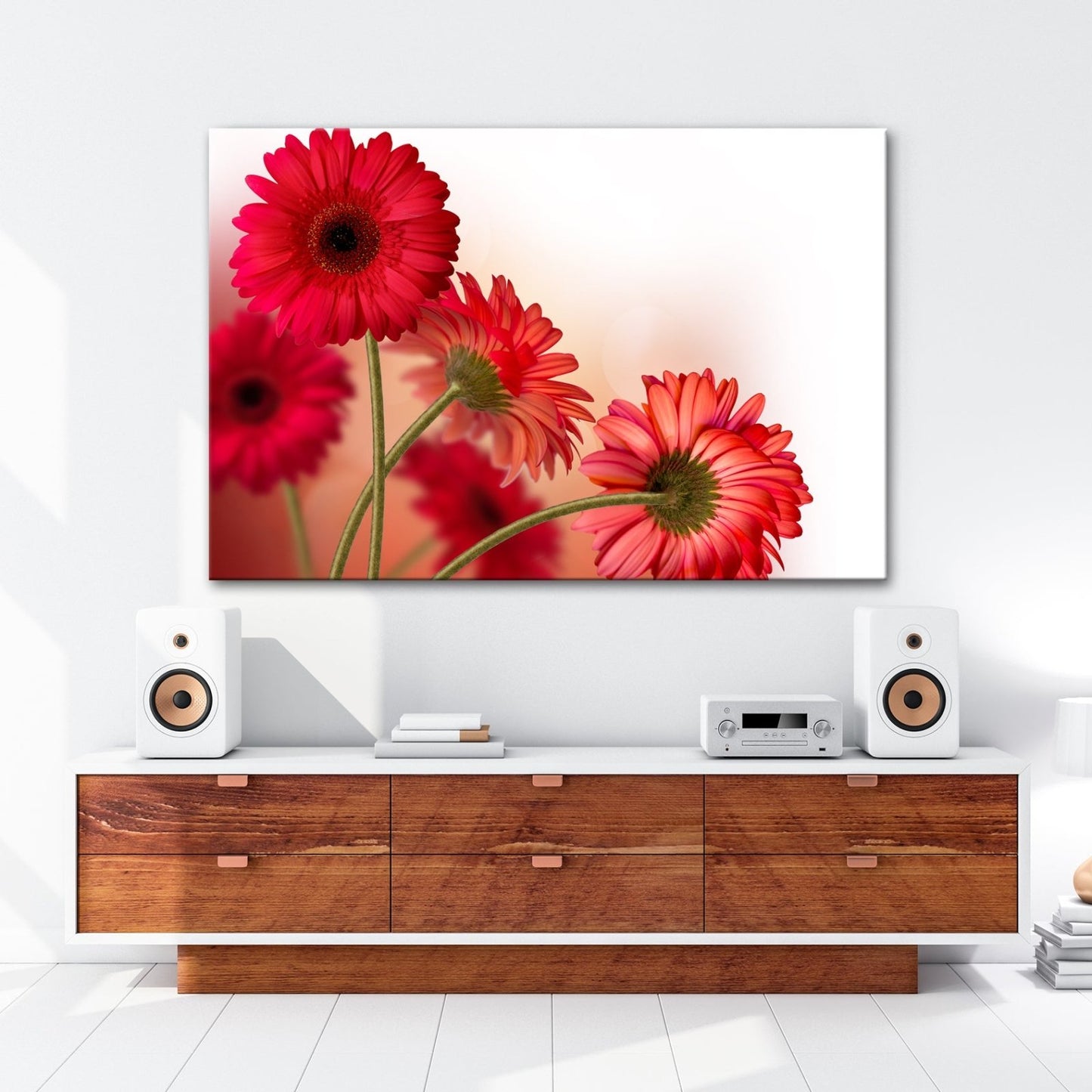 Leinwandbild Leuchtende Gerbera tanzen im warmen Licht des Morgens. - deyoli