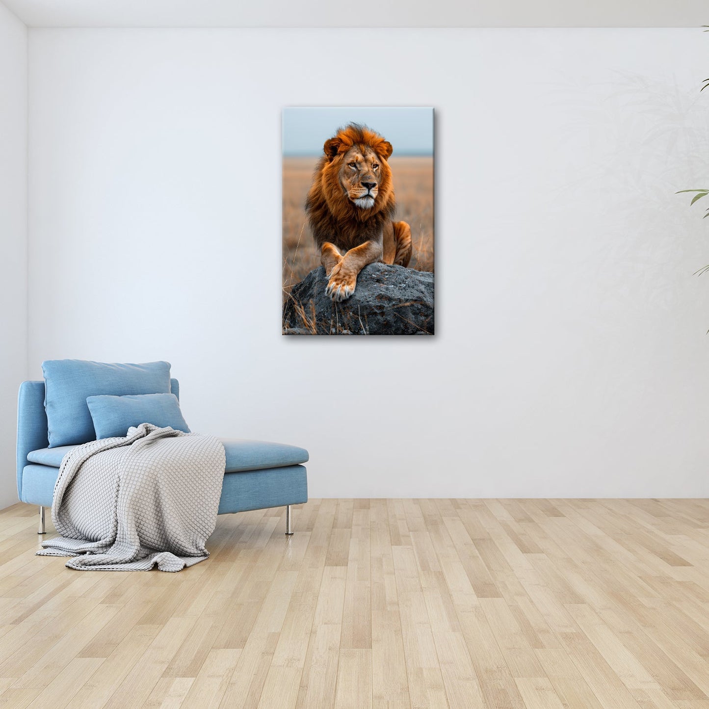 Leinwandbild Majestätischer Löwe ruht wachsam auf felsigem Thron. - deyoli