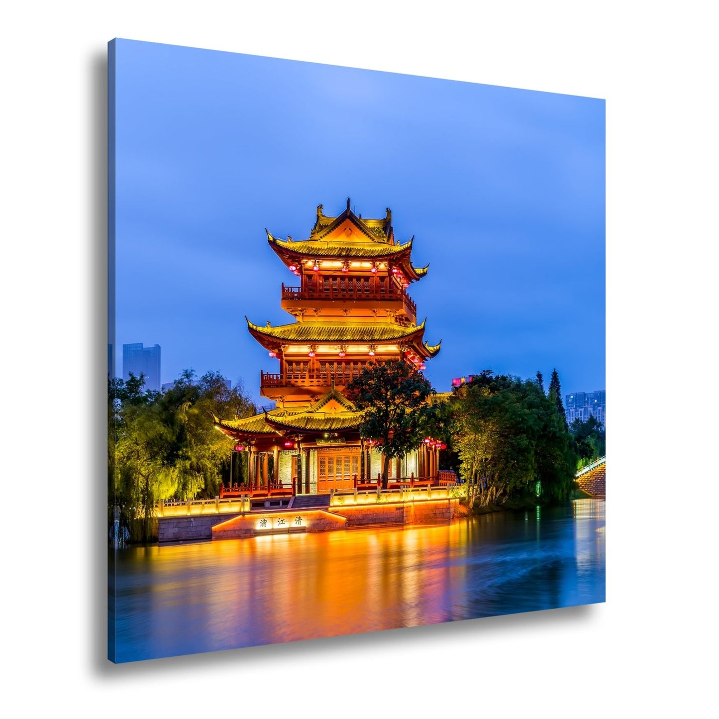 Leinwandbild Pagode im Abendglanz – Tradition spiegelt sich im Wasser. - deyoli