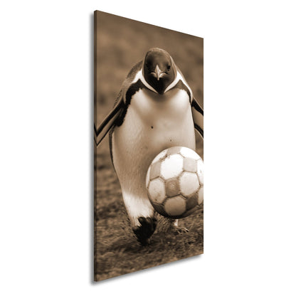 Leinwandbild Pinguin mit Ballgefühl – elegant auf dem Spielfeld. - deyoli