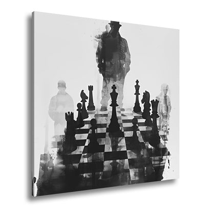 Leinwandbild Schachfiguren im Schatten eines geheimnisvollen Spielers - deyoli