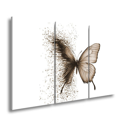 Leinwandbild Schmetterling löst sich in kunstvolle Partikel auf - deyoli