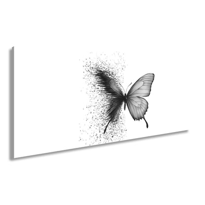 Leinwandbild Schmetterling löst sich in kunstvolle Partikel auf - deyoli