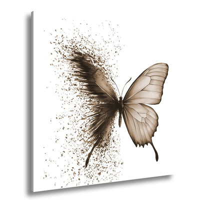 Leinwandbild Schmetterling löst sich in kunstvolle Partikel auf - deyoli