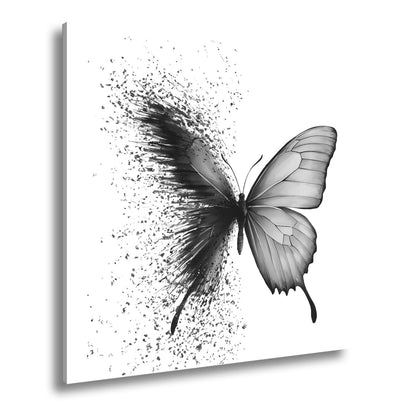 Leinwandbild Schmetterling löst sich in kunstvolle Partikel auf - deyoli