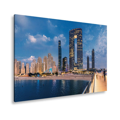 Leinwandbild Skyline XXL – Moderne Hochhäuser am Meer bei Sonnenuntergang - deyoli