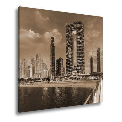 Leinwandbild Skyline XXL – Moderne Hochhäuser am Meer bei Sonnenuntergang - deyoli