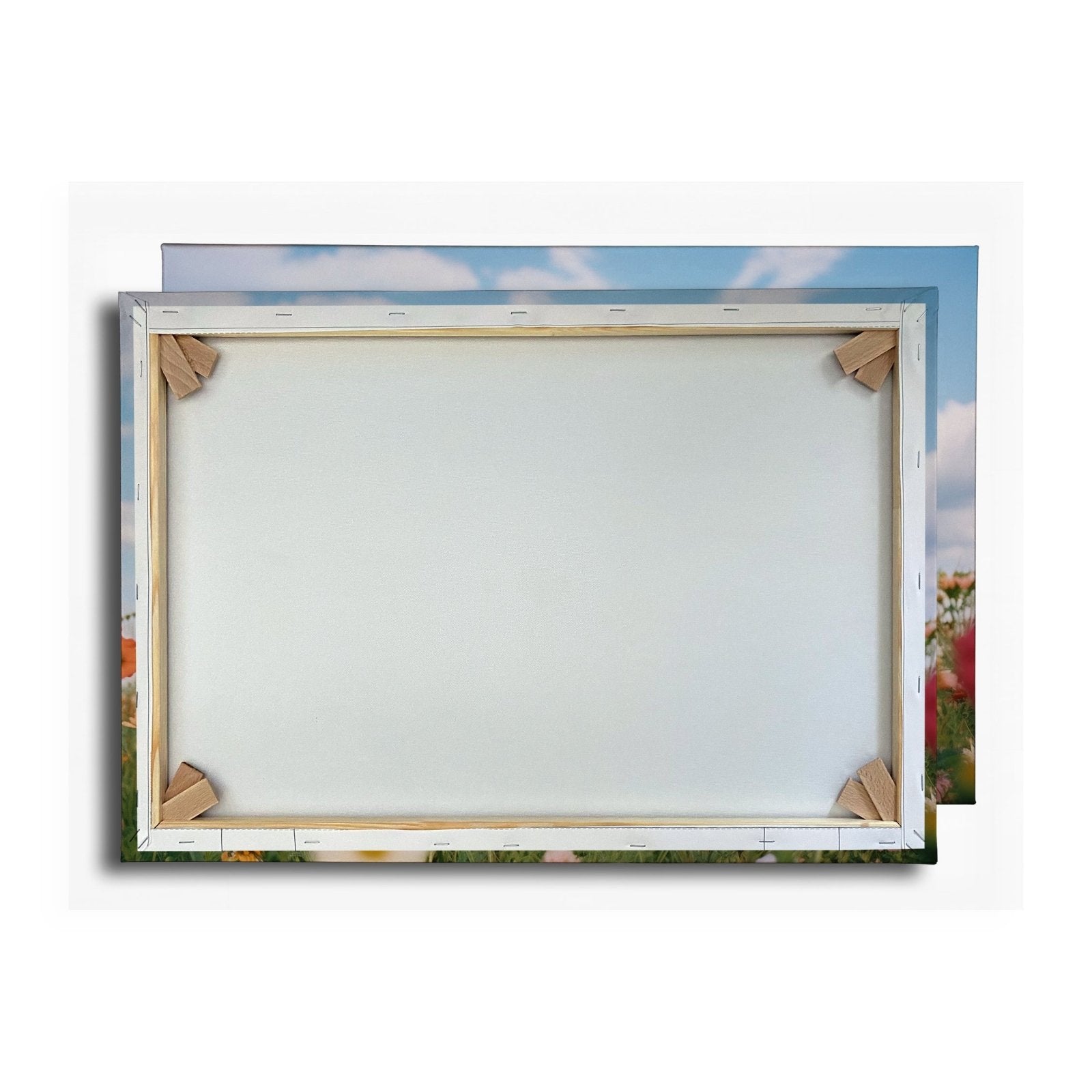 Leinwandbild Sommerwiese tanzt unter Wolken im goldenen Licht. - deyoli