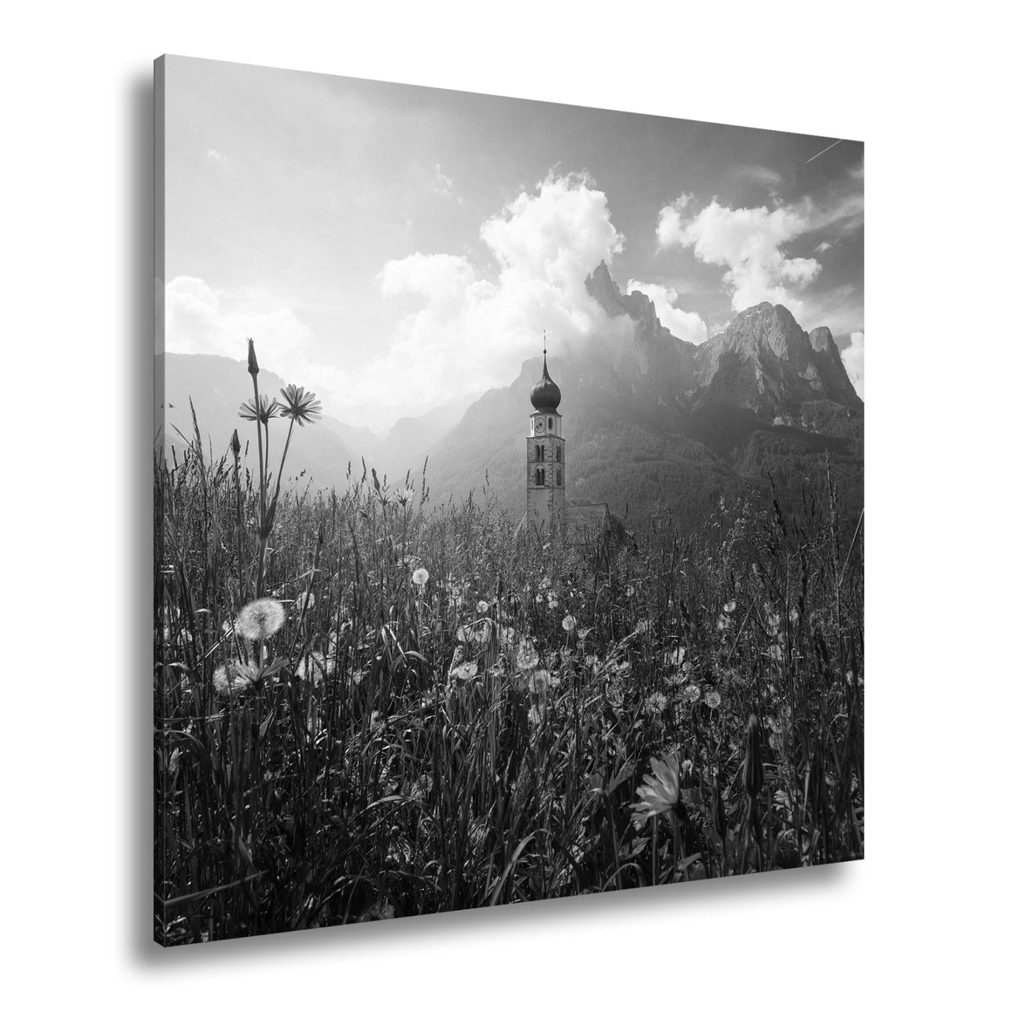Leinwandbild Sommerwiese und Kirchturm vor majestätischer Bergkulisse - deyoli