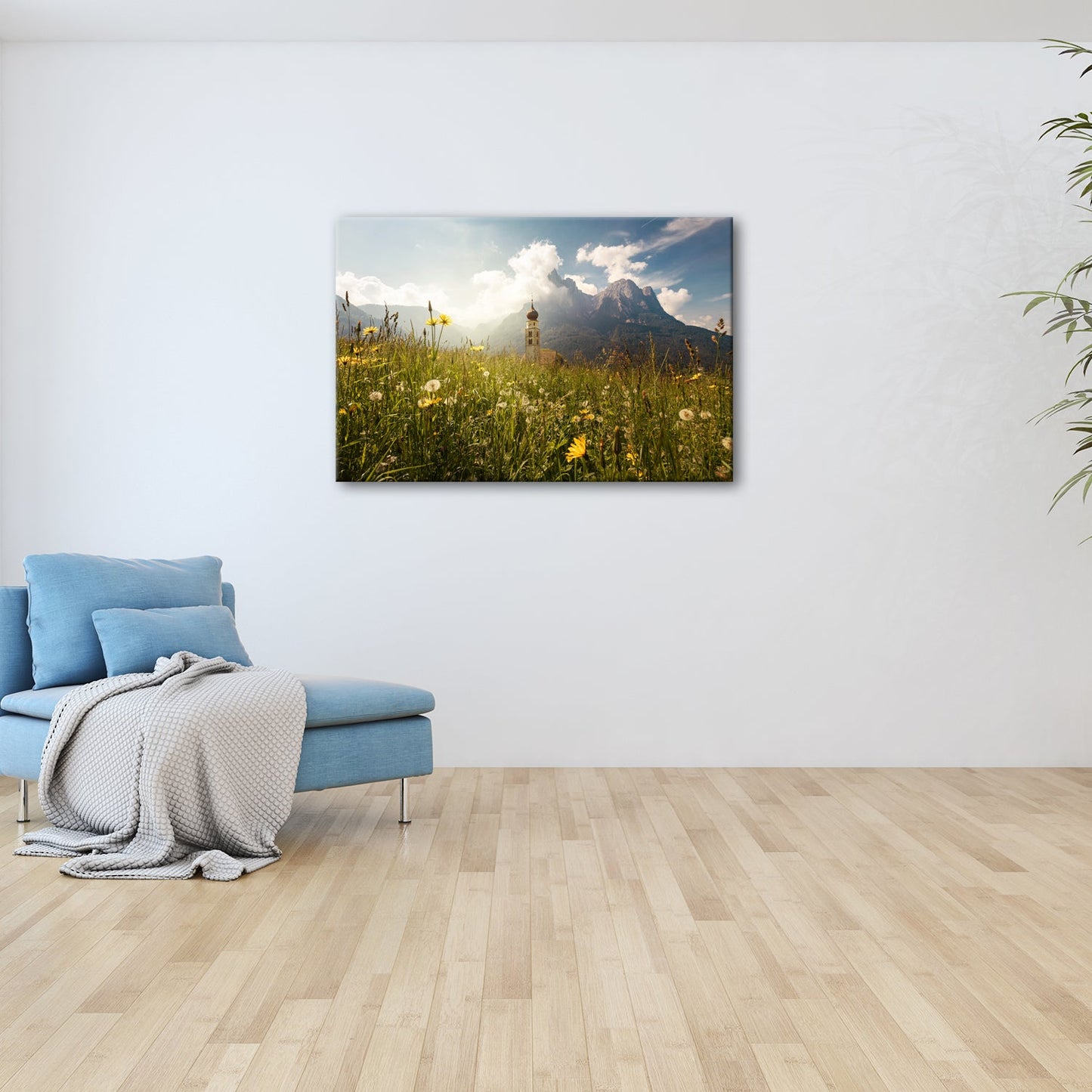 Leinwandbild Sommerwiese und Kirchturm vor majestätischer Bergkulisse - deyoli