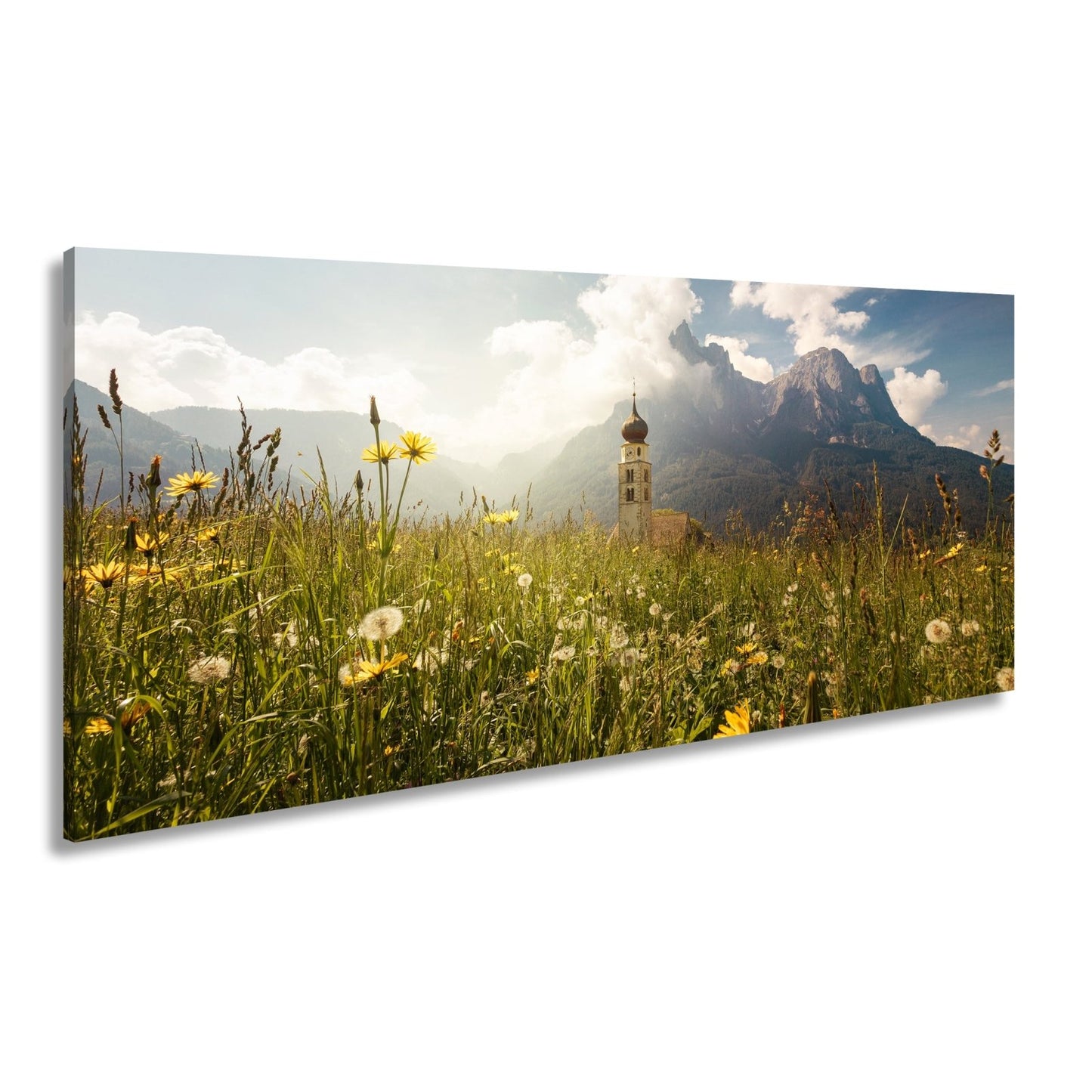 Leinwandbild Sommerwiese und Kirchturm vor majestätischer Bergkulisse - deyoli