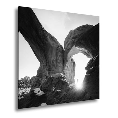Leinwandbild Sonnenaufgang durch majestätische Felsbögen – Natur XXL - deyoli
