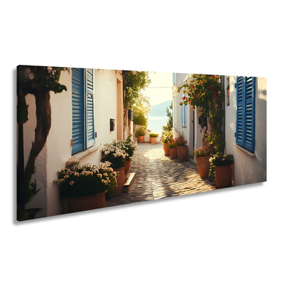Leinwandbild Sonnengeküsste Gasse – Mediterraner Charme XXL - deyoli